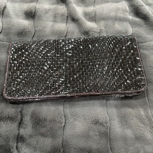 Patent leather woven clutch. Used like new